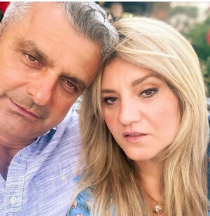 Flamur Rexha with his wife.